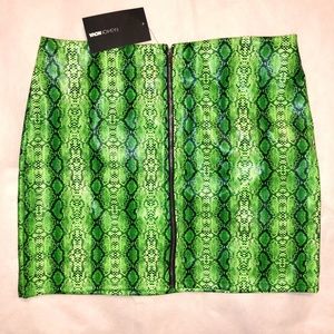 Black and lime green mini skirt.